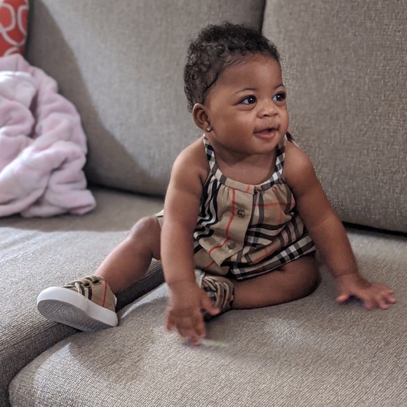 The Burberry outfit size 6m worn once for pictures
